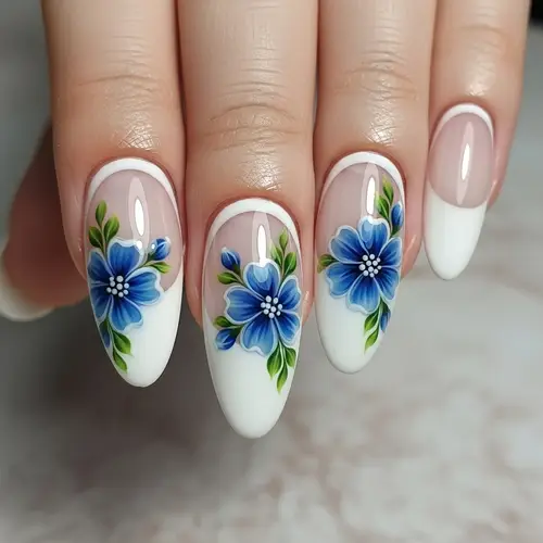 Elegant Almond-Shaped French Tip Nails with Blue Flowers