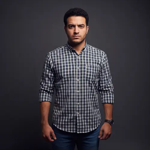 Intense Middle-Eastern Man in Casual Attire | Expressive Eyes