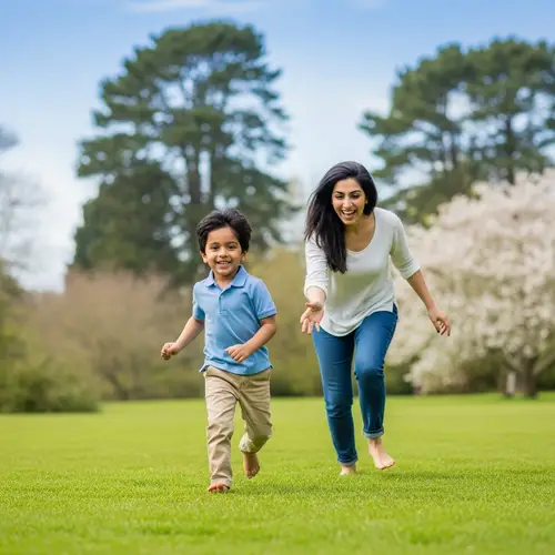 Cheerful South Asian Boy and Mother Playing in Grassy Field