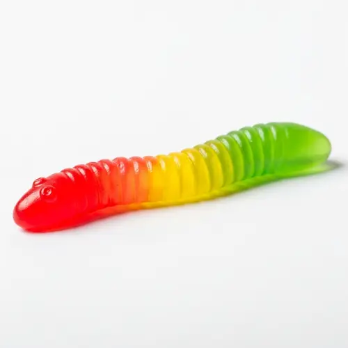 Vibrant Gummy Worm Candy on White Background