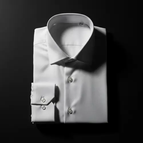 Crisp White Shirt on Black Background | Elegant Sophistication