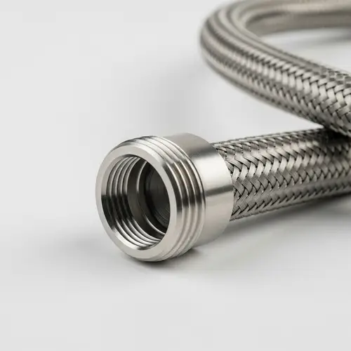 Stainless Steel Braided Gas Pipe on White Background - Industrial Photography