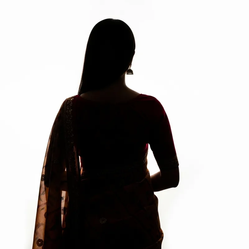 Mysterious Woman Figure on White Background