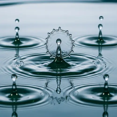 Captivating Image of Six Water Droplets Falling into Water