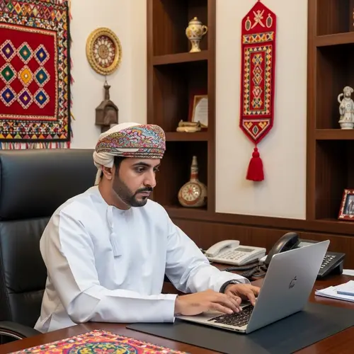 Professional Omani Man Working in Well-Lit Office | Culture-Inspired Workspace