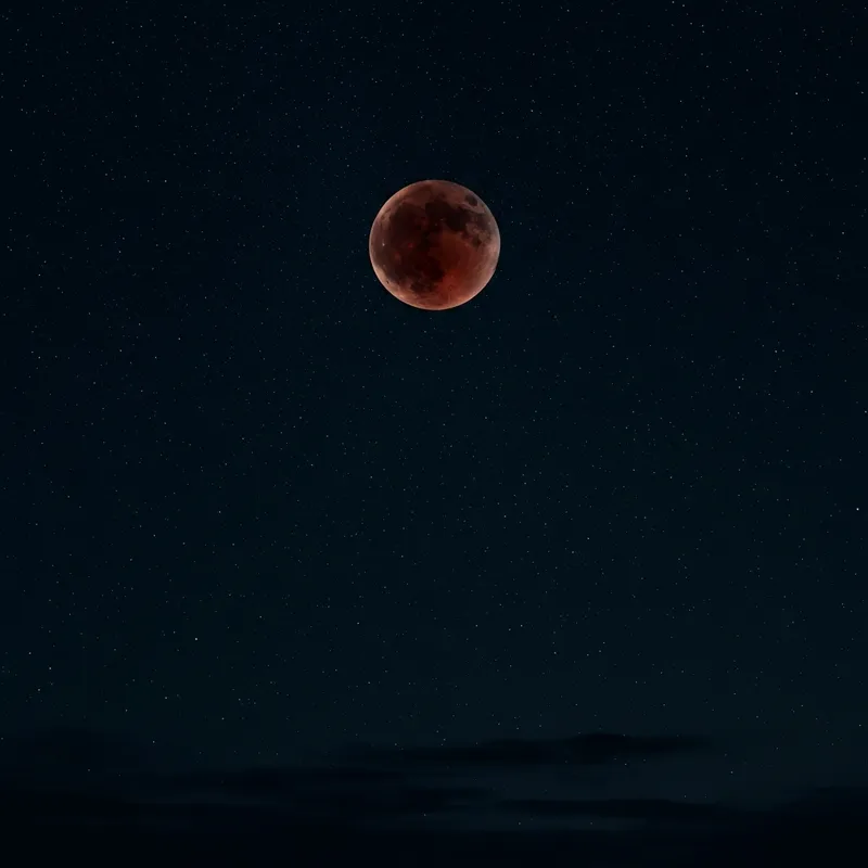 Spectacular Blood Moon in Starry Night Sky