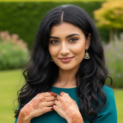 Beautiful South Asian Woman in Elegant Teal Dress