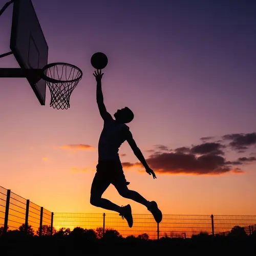 Finger Roll Layup: Striking Silhouette of Basketball Player