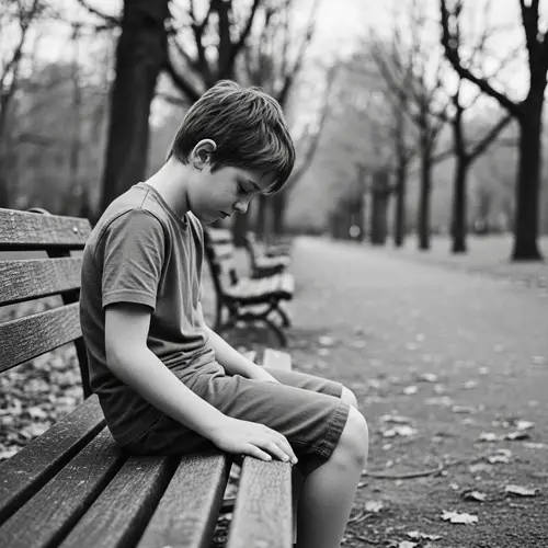 Youthful Heartache: Melancholic Boy on Wooden Bench in Empty Park