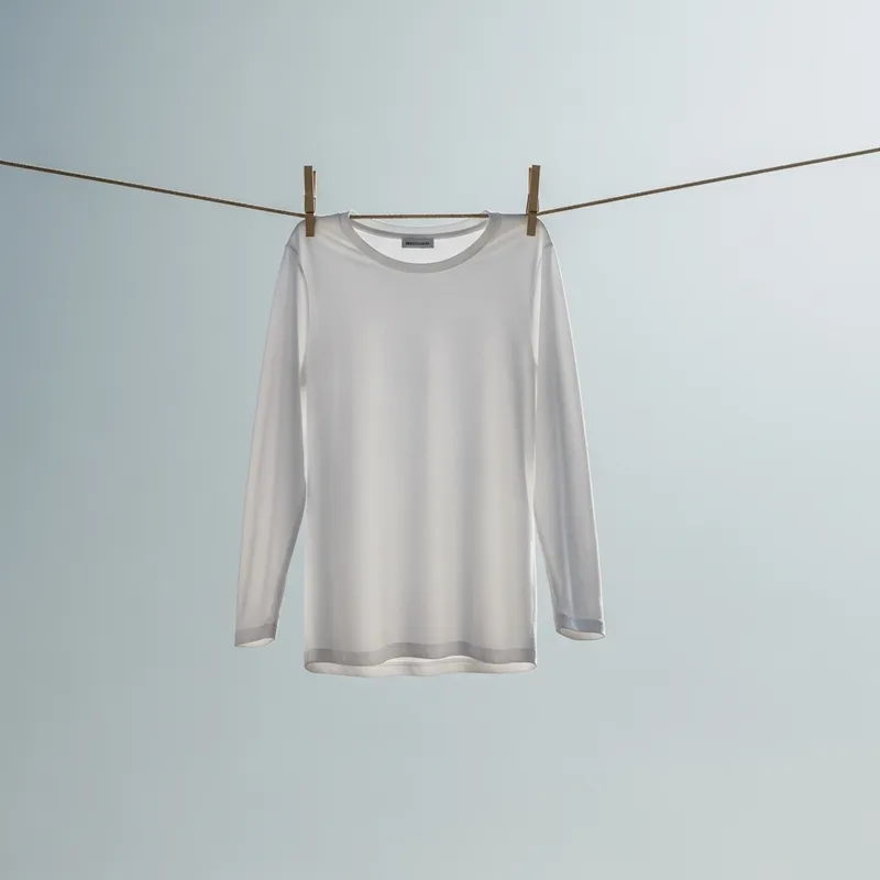 White Long-Sleeve Shirt Hanging on Clothespins | Blue Sky Background
