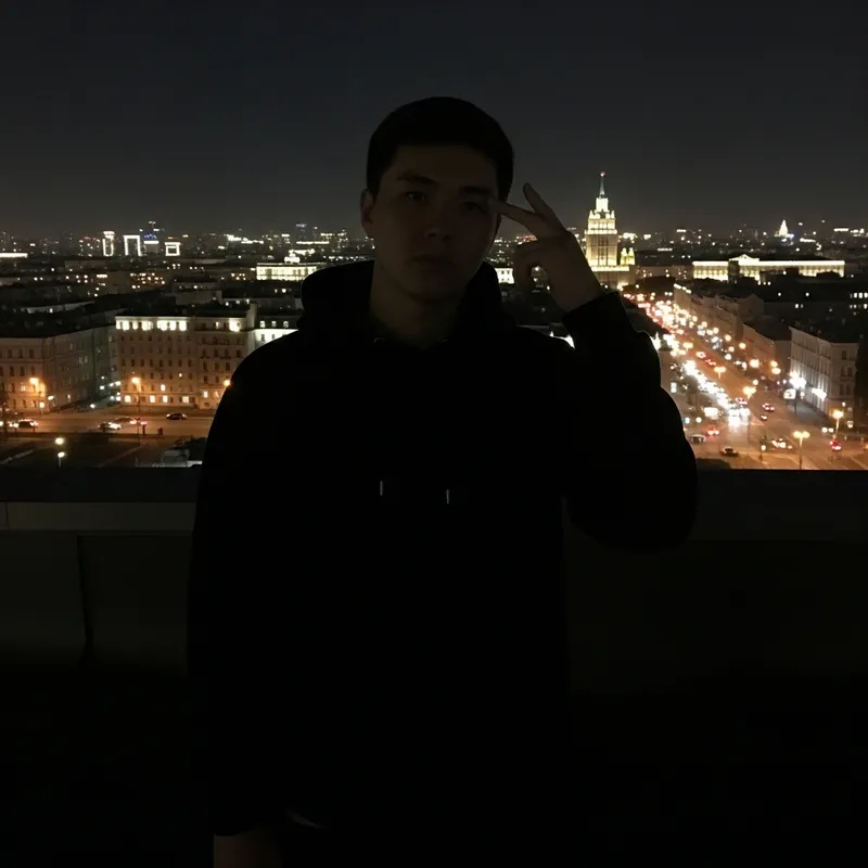 Man Contemplating on Moscow Rooftop at Night
