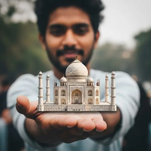 Taj Mahal Miniature: Captivating Image of Handheld Marvel