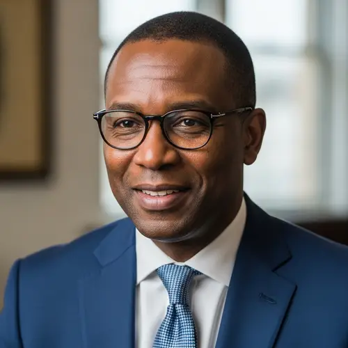 Professional African Descended Male Public Figure in Formal Suit