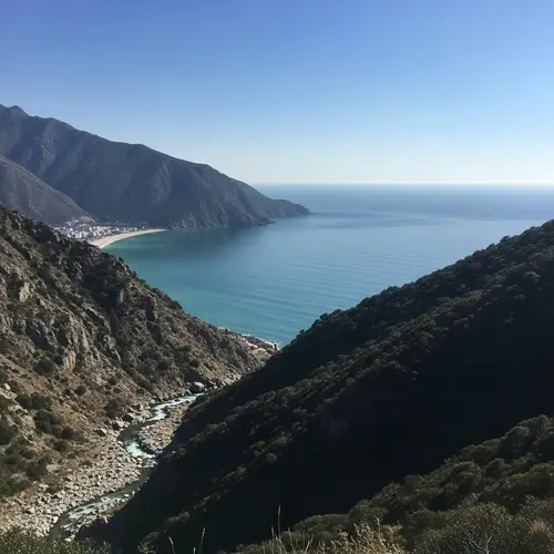 Serene Mountain River to Vast Sea: Tranquil Ocean Landscape