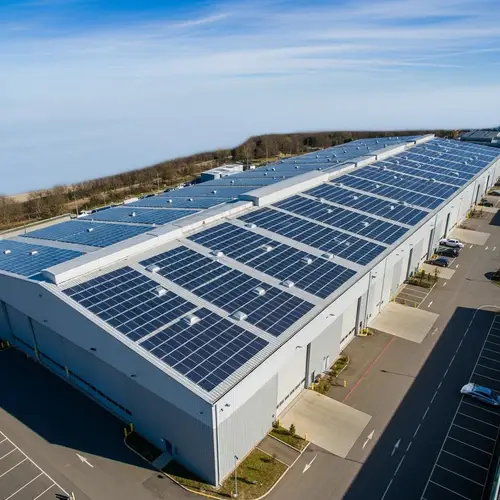 Bird's Eye View of Solar Panel Equipped Photovoltaic Hangar