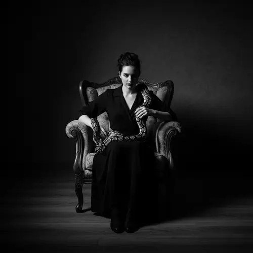 Surreal Photography: Woman with Snake in Timeless Scene