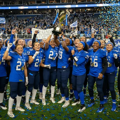 Triumphant Women's Football Team Celebrating Victory