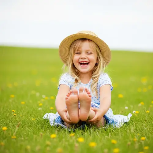 Joyful Barefoot Girl on Lush Meadow | Summer Laughter