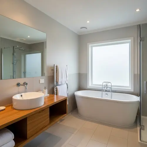 Modern Bathroom Renovation with Freestanding Bathtub and Stylish Fixtures