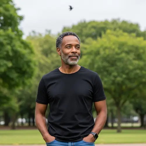 Middle-Aged Black Man in Casual Attire & Serene Park Setting
