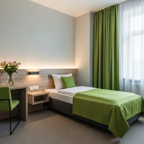 Minimalist Cozy Hotel Room with Green Bedding