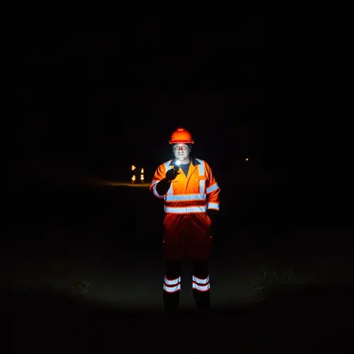 Realistic Orange and Fluorescent Work Uniform Glowing in the Dark