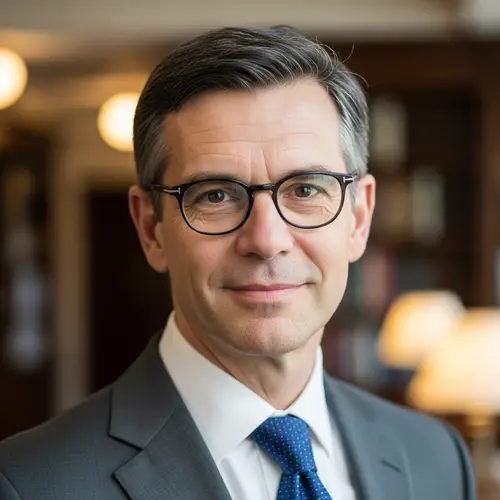 Professional Middle-Aged Male Portrait with Gentle Smile