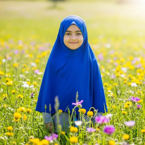 Vibrant Blue Hijab in Sunny Meadow - Middle-Eastern Girl