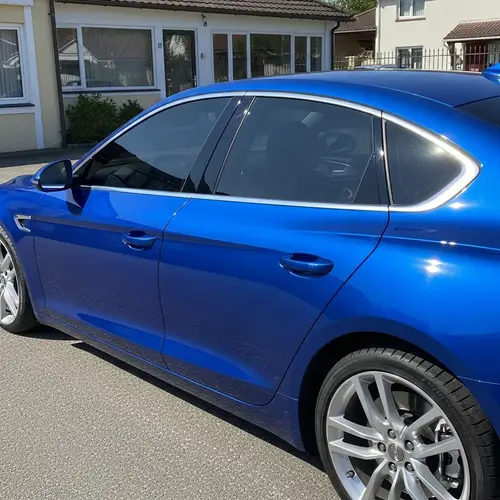 Sleek, Modern Royal Blue Car | High-Speed Aerodynamic Design