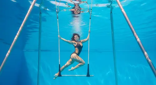 Underwater Circus Acrobat Darya Vintilova on Trapeze | Blue Water Beauty