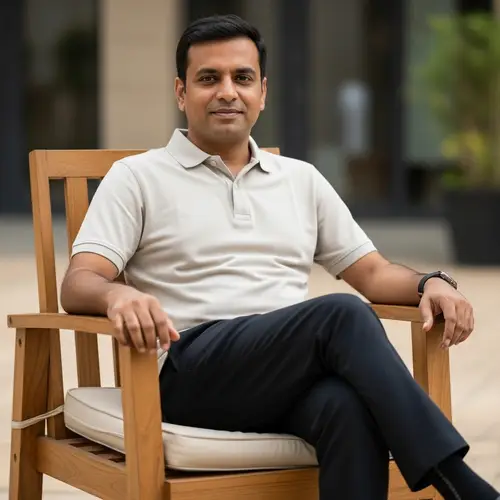 A Man Sitting on a Chair: Relaxed and Calm Vibes