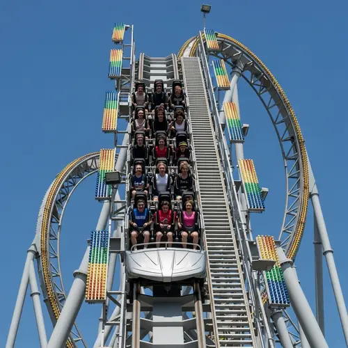 Thrilling Roller Coaster with Eager Passengers | Excitement in the Sky