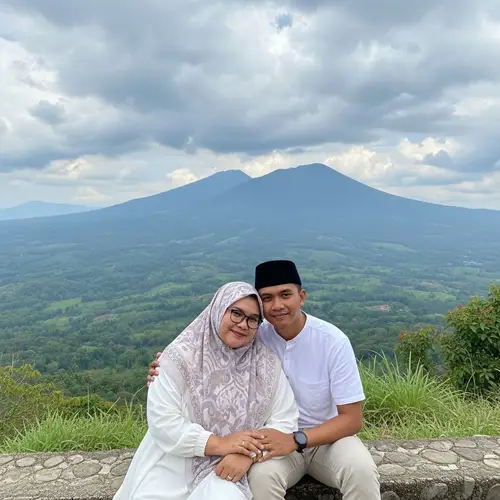 Southeast Asian Couple in White Attire Enjoying Mountain View