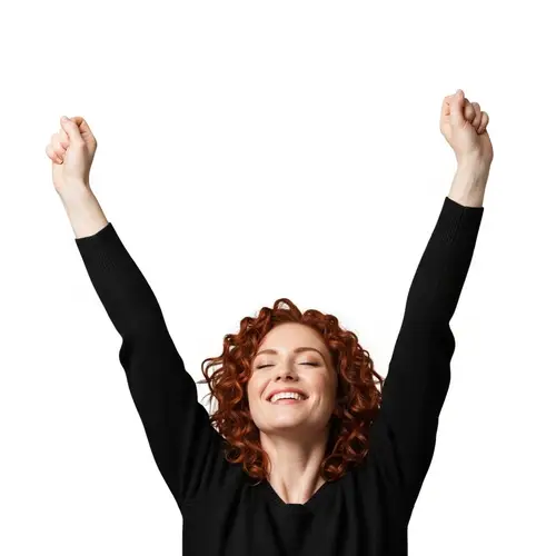 Radiant Redheaded Woman with Raised Arms