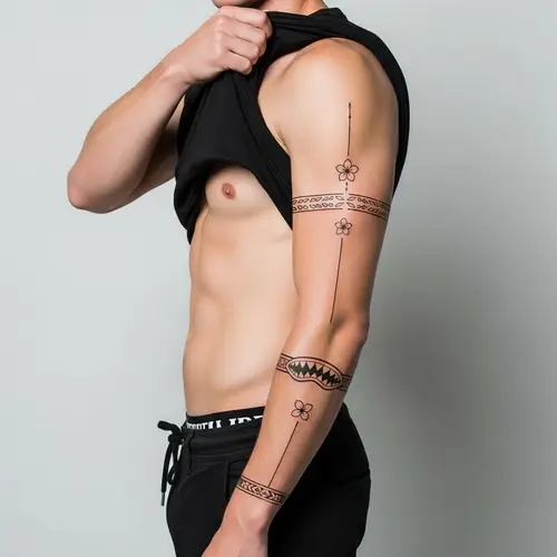 Male Tribal Sleeve Tattoo Design with Small Flower Motifs and Sharktooth