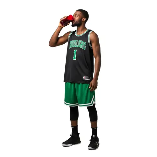 African-American Basketball Player Enjoys Grape Juice