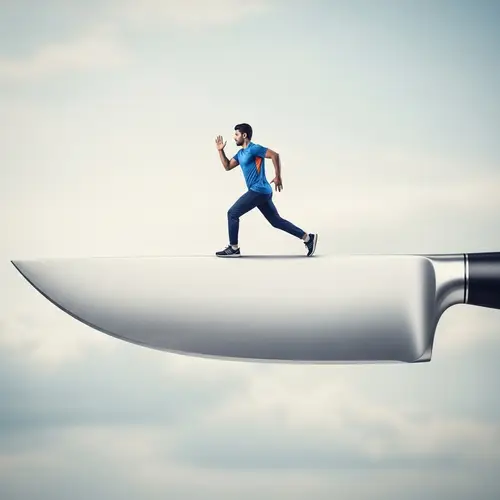 South Asian Man Sprinting on Colossal Knife Blade