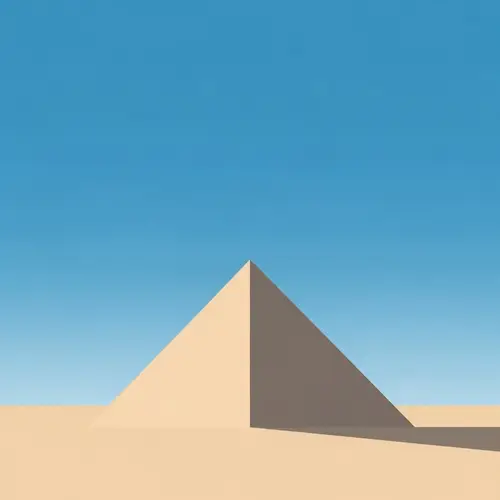 Large Pyramid in Expansive Desert Under Azure Sky
