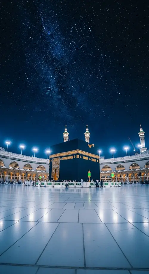 Breathtaking Night Scene in Mecca: Illuminated Kaaba in Ethereal Colors