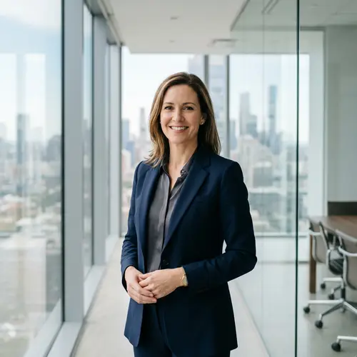 Modern CEO Portrait in Minimalist Glass Office