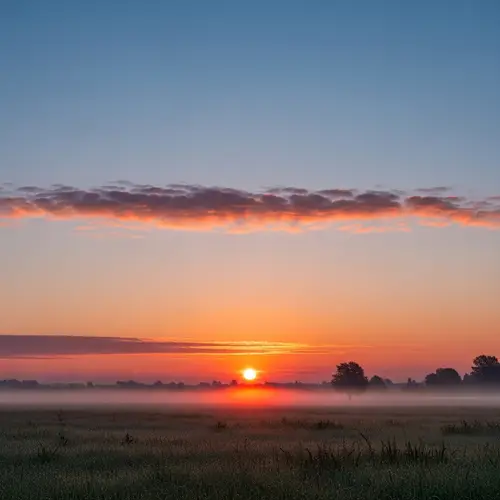 Serene Morning Sunrise: Pink & Orange Sky Landscape