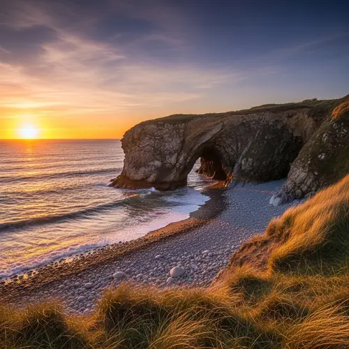 Majestic Coastal Cave at Sunset - Explore Nature's Sculpture