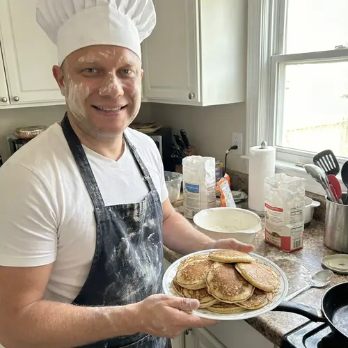 Chef in Apron with Fresh Pancakes | Cooking Fun