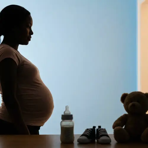 Beautiful Pregnancy Silhouette: Expecting Black Woman Profile