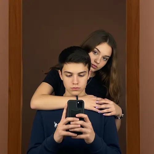 Serious Reflection: A Boy and Girl in the Mirror