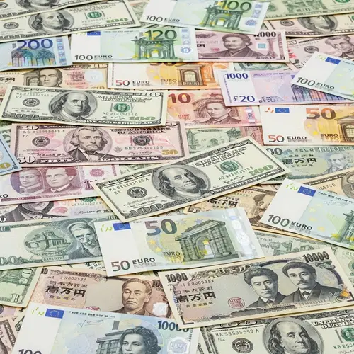 Colorful Currency Background for Financial Themes