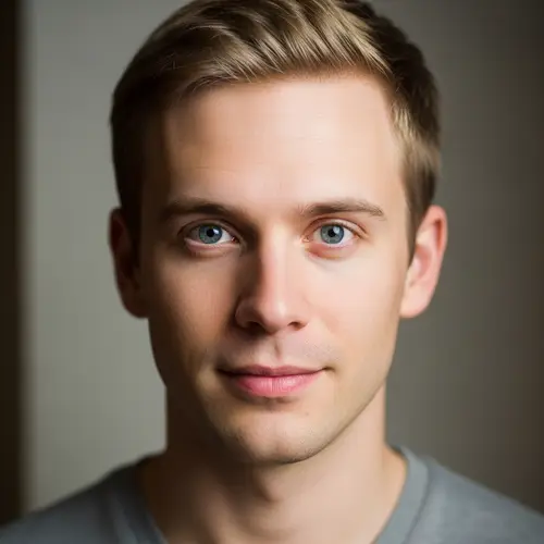 25-Year-Old Caucasian Man with Short Blond Hair | Peaceful Expression