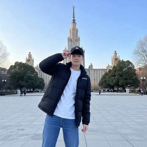 Stylish Winter Outfit: Confident Young Man - University Architecture