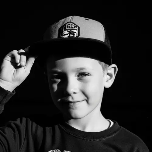 Monochrome Fine Art Photography of Playful Young Boy