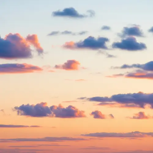 Tranquil Sunset Sky with Varied Color Clouds